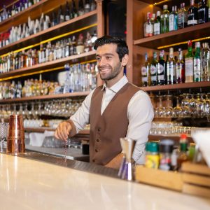 Bartender Preparing Cocktail at Upscale Bar